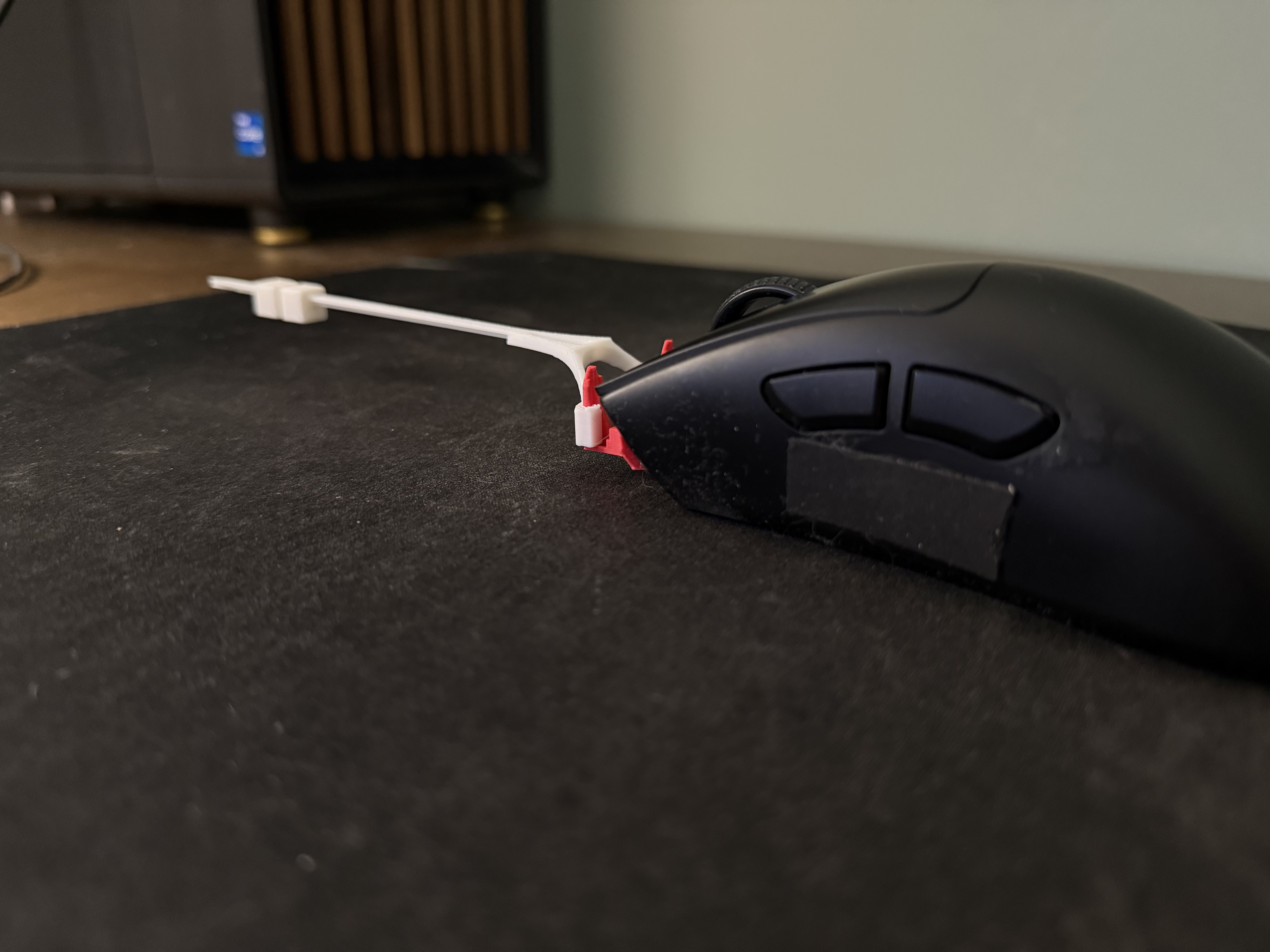 Vekko MK—I stabilizer installed on gaming mouse